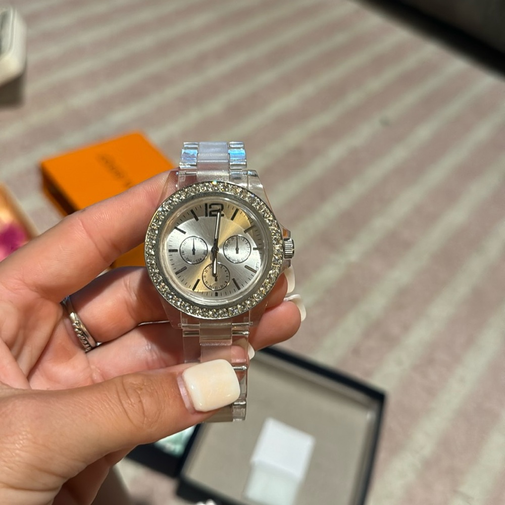 Clear band diamond watch